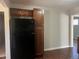 Kitchen features include updated brown cabinetry and modern appliances at 772 Victor St, Aurora, CO 80011