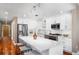 Charming kitchen featuring a marble countertop island and stainless steel appliances at 1631 N Emerson St # 117, Denver, CO 80218