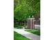 Well-maintained sidewalk and landscaping with brick accents, providing a welcoming atmosphere at 1631 N Emerson St # 117, Denver, CO 80218