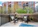 Serene patio with outdoor seating, perfect for relaxing and enjoying the surrounding views at 1631 N Emerson St # 117, Denver, CO 80218