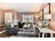 Comfortable living room with neutral tones, soft lighting, and decorative accents at 9866 Spring Hill Ln, Highlands Ranch, CO 80129