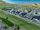Picturesque neighborhood with modern homes, white fences, and lush green spaces offers a serene and inviting community at 3790 Mighty Oaks St, Castle Rock, CO 80104