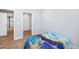 Bedroom with hardwood flooring and doorways to other parts of the house at 3790 Mighty Oaks St, Castle Rock, CO 80104