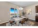 Bright dining area with sliding glass doors and modern decor at 3790 Mighty Oaks St, Castle Rock, CO 80104