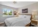 Bright bedroom with large window and hardwood floors at 3040 S Dexter Way, Denver, CO 80222