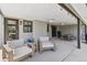 Covered patio with comfortable seating and a ceiling fan at 3040 S Dexter Way, Denver, CO 80222