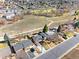 Aerial view of a charming neighborhood near open space, showcasing the property's location at 10699 W 9Th Pl, Lakewood, CO 80215