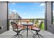 Inviting balcony showcasing seating with city views, perfect for relaxing and enjoying the outdoors at 155 Steele St # 414, Denver, CO 80206