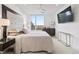 Comfortable bedroom with a large window, plush bedding, and a modern design at 155 Steele St # 414, Denver, CO 80206