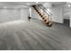 Finished basement with carpeting and modern staircase at 2685 S Dayton Way # 74, Denver, CO 80231