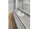 Updated bathroom with new vanity and tiled floors at 2685 S Dayton Way # 74, Denver, CO 80231