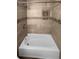 Clean bathroom with a shower/tub combo and modern tile at 2685 S Dayton Way # 74, Denver, CO 80231