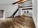 Open living area with hardwood floors and loft access at 2685 S Dayton Way # 74, Denver, CO 80231