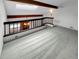 Open loft area with skylight and wood beams at 2685 S Dayton Way # 74, Denver, CO 80231