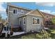 Spacious backyard featuring a patio with a hot tub, and lush greenery at 12233 Hannibal St, Commerce City, CO 80603