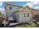 Cozy backyard with a well-maintained patio, a relaxing hot tub, and pleasant outdoor seating area at 12233 Hannibal St, Commerce City, CO 80603