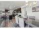 Well-designed dining area offering access to the kitchen and adjacent rooms, ideal for Gathering meals at 12233 Hannibal St, Commerce City, CO 80603