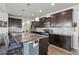 Modern kitchen featuring stainless steel appliances, spacious countertops, and ample cabinet space at 12233 Hannibal St, Commerce City, CO 80603