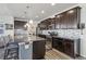 Spacious kitchen with modern countertops, ample storage, stainless steel appliances, and a functional island at 12233 Hannibal St, Commerce City, CO 80603