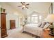 Inviting main bedroom with a large window, vaulted ceiling, and elegant furnishings at 1210 Snowberry Ln, Broomfield, CO 80020