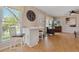 Bright breakfast nook leads to a living room that provides an open, airy feel to the home at 9901 E Evans Ave # 9A, Aurora, CO 80247