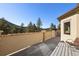 Backyard deck offering mountain views, stone pillar accents and wooded hillside at 21016 Horse Bit Way, Morrison, CO 80465