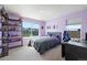 Bedroom featuring light walls and a window that fills the room with natural light at 2144 Rosette Ln, Castle Rock, CO 80104