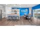 Spacious kitchen with a large island, stainless steel appliances, and adjacent dining area at 2144 Rosette Ln, Castle Rock, CO 80104