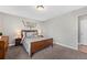 Primary bedroom with wood bed frame and city view at 1196 N Grant St # 710, Denver, CO 80203