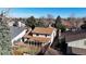 Aerial view of a lovely home with a covered patio and lush landscaping at 12260 E Bates Cir, Aurora, CO 80014