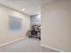 Neutral colored bedroom with a modern desk area and plenty of natural light from the window at 13439 Antlers St, Broomfield, CO 80020