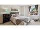 A bright and calming bedroom features a comfortable bed and natural light at 13439 Antlers St, Broomfield, CO 80020