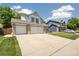 Charming two-story home with a spacious three-car garage and a well-manicured lawn and landscape at 13439 Antlers St, Broomfield, CO 80020