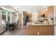 Well-lit kitchen with stainless steel appliances, granite countertops, and a cozy breakfast nook at 13439 Antlers St, Broomfield, CO 80020