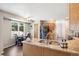 Spacious kitchen with granite countertops, stainless steel appliances, and an eat-in breakfast area at 13439 Antlers St, Broomfield, CO 80020
