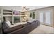 Cozy living room includes fireplace, backyard access, and an open floorplan at 13439 Antlers St, Broomfield, CO 80020