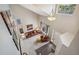 Bright living room boasts soaring ceilings, natural light, and comfortable seating area at 13439 Antlers St, Broomfield, CO 80020