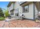 Backyard patio with a stainless steel grill and a comfortable seating area at 13250 Wild Basin Way, Broomfield, CO 80020