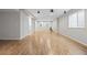Spacious finished basement featuring wood-look floors, natural light, and neutral paint at 13250 Wild Basin Way, Broomfield, CO 80020