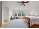 Spacious bedroom with hardwood floors and large windows, offering a comfortable retreat at 13250 Wild Basin Way, Broomfield, CO 80020