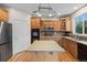 Spacious kitchen with a central island, stainless steel appliances, and abundant cabinet space, great for culinary enthusiasts at 13250 Wild Basin Way, Broomfield, CO 80020