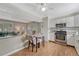 Bright kitchen flowing into the living room, featuring stainless steel appliances at 11957 Claude Ct, Northglenn, CO 80233