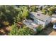 Aerial view of a large two-story home with a spacious backyard and patio area at 10640 W 46Th Ave, Wheat Ridge, CO 80033