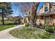 Charming two-story home with a well-maintained lawn and mature landscaping at 9917 Grove Way # A, Westminster, CO 80031