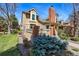Beautiful exterior view of a home with lush greenery and architectural details at 9917 Grove Way # A, Westminster, CO 80031