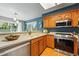 Charming kitchen with stainless steel appliances and views to the backyard at 9917 Grove Way # A, Westminster, CO 80031
