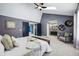 Open main bedroom with vaulted ceilings, skylights, and ensuite bath at 9917 Grove Way # A, Westminster, CO 80031