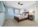 Bedroom with ceiling fan and window views at 5510 W 103Rd Ave, Westminster, CO 80020