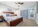 Spacious bedroom with ceiling fan and en-suite bathroom at 5510 W 103Rd Ave, Westminster, CO 80020