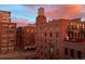 Evening city view with sunset colors and brick buildings at 1435 Wazee St # 504, Denver, CO 80202